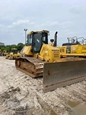 Front of used Komatsu in yard for Sale